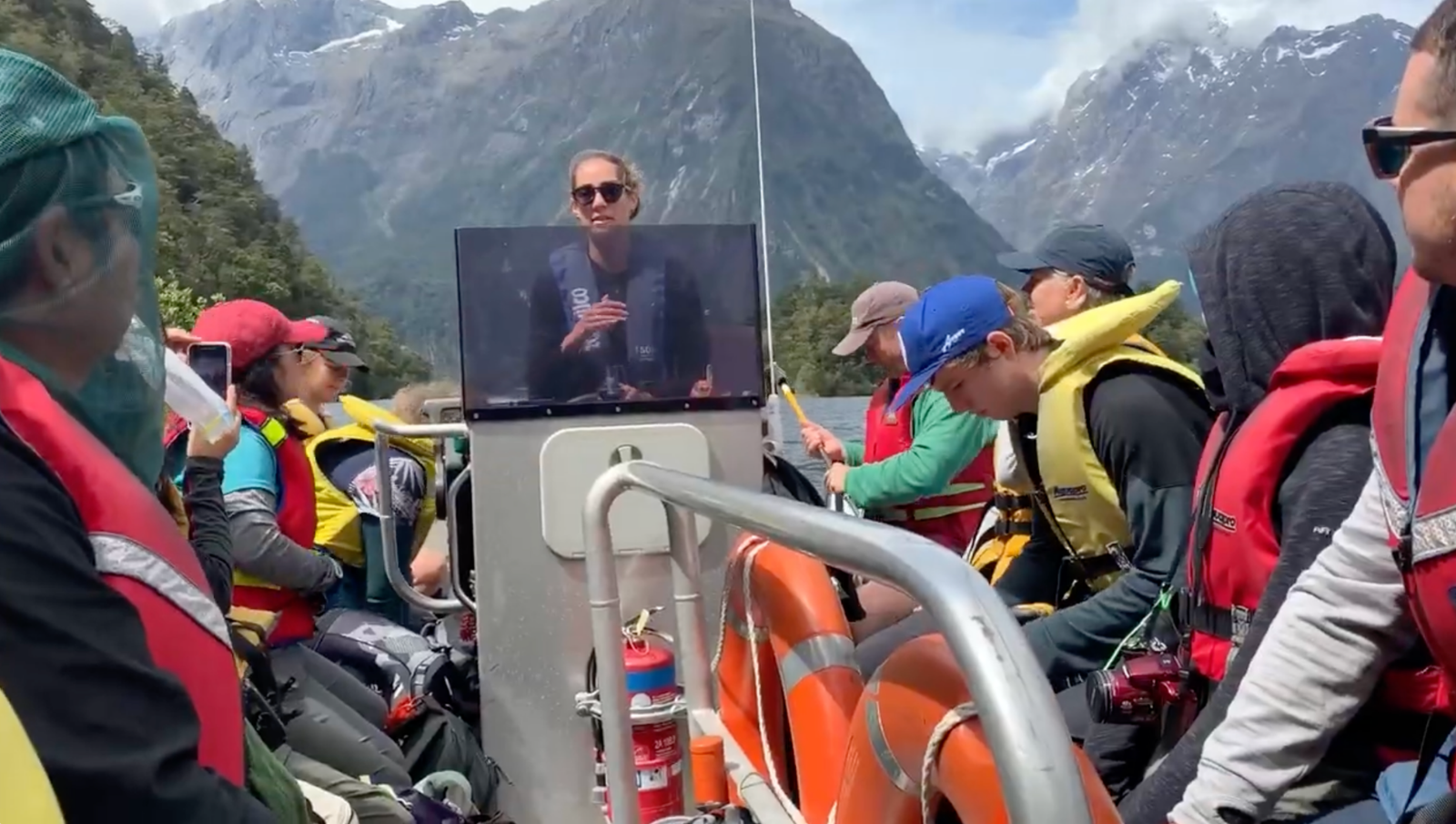 Crowded tourist boat at the end of the Milford Track