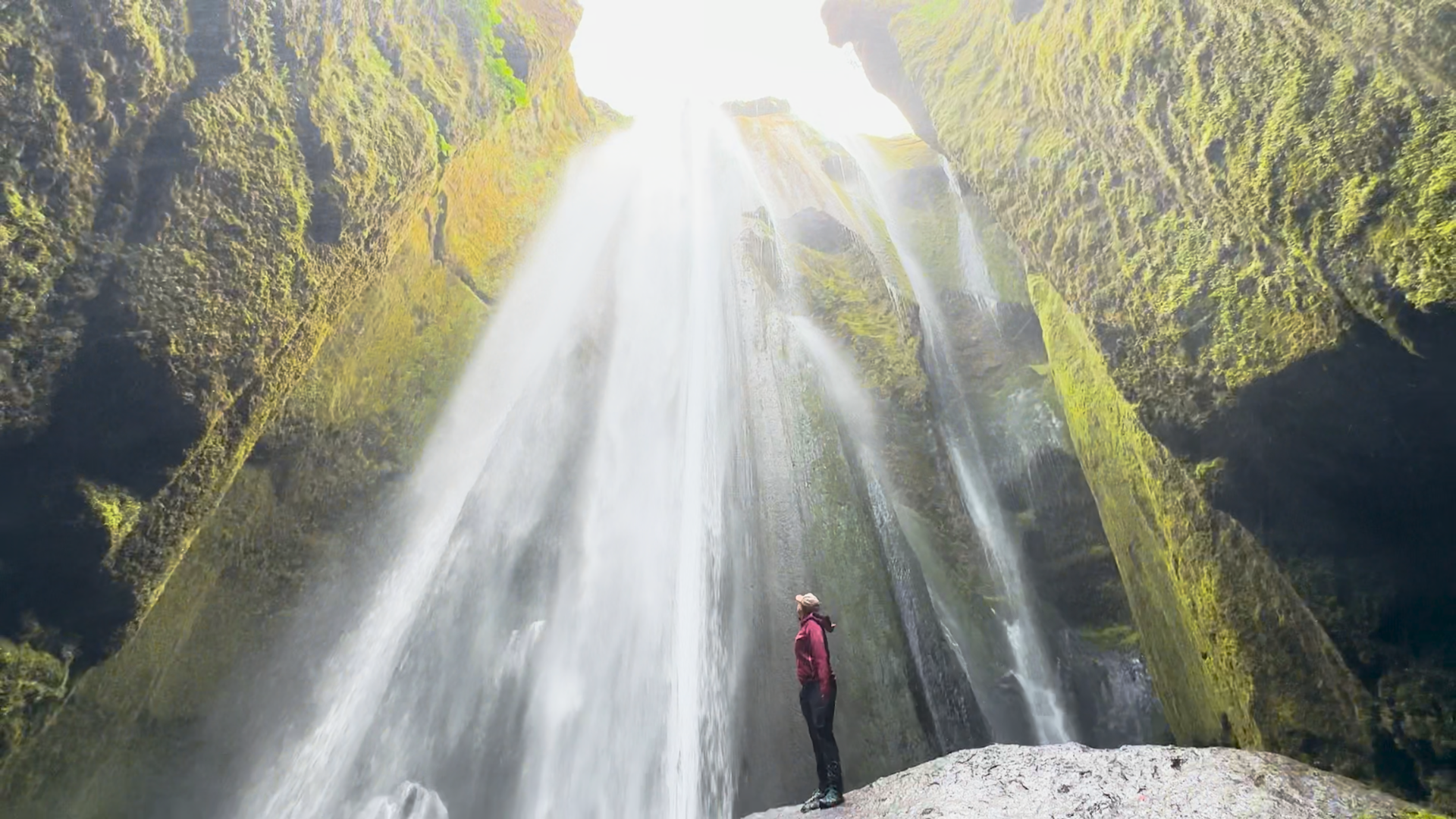 Jen hiking to a secret waterfall in the Highlands